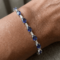 Alternating Blue Sapphire Oval & Baguette Cut Tennis Bracelet For Women