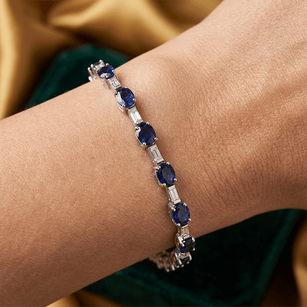 Alternating Blue Sapphire Oval & Baguette Cut Tennis Bracelet For Women