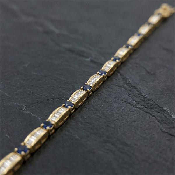 Golden Round & Baguette Cut Blue & White Sapphire Tennis Bracelet For Women