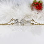 Three Stone Yellow Gold Pear & Emerald & Round Cut White Sapphire Chain Bracelet For Women