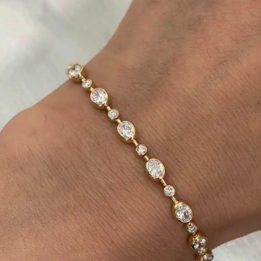 Classic Bezel Yellow Gold Oval & Round Cut White Sapphire Line Tennis Bracelet For Women