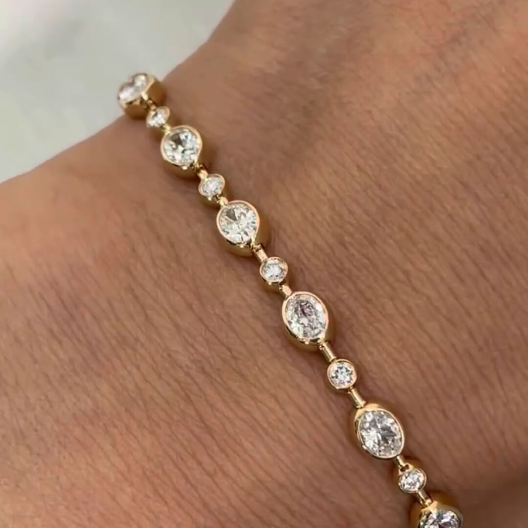 Classic Bezel Yellow Gold Oval & Round Cut White Sapphire Line Tennis Bracelet For Women