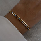 Unique Design Yellow Gold Round Cut Blue Sapphire Bangle Bracelet For Women