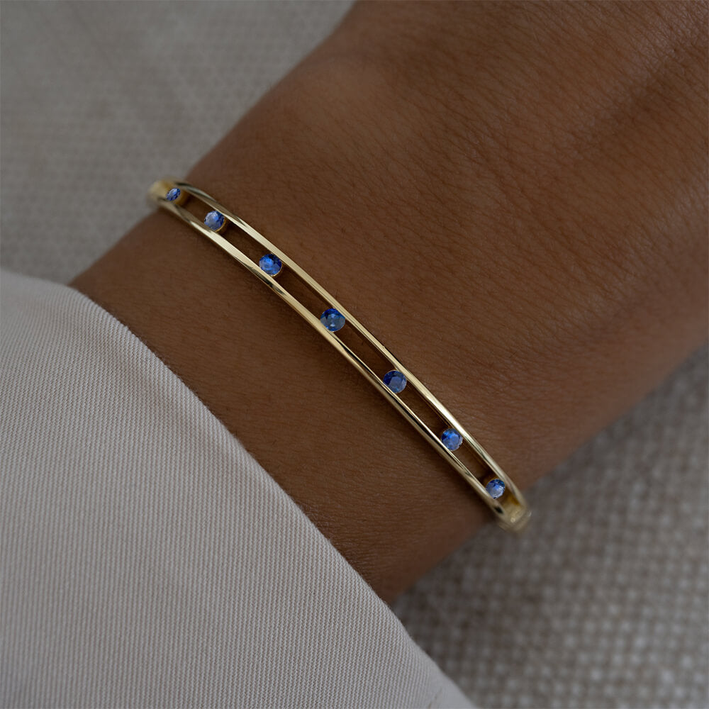 Unique Design Yellow Gold Round Cut Blue Sapphire Bangle Bracelet For Women