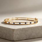 Unique Design Yellow Gold Round Cut Blue Sapphire Bangle Bracelet For Women