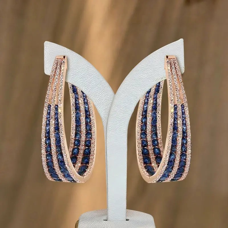 Rose Gold Multi Row Round Cut Blue Sapphire Hoop Earrings For Women belovegrace.com
