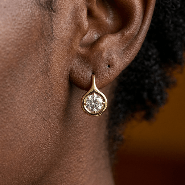 Solitaire Bezel Set Round Cut Yellow Gold Drop Earrings For Women