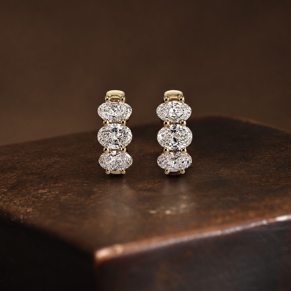 Classic Three Stone Yellow Gold Oval Cut White Sapphire Hoop Earrings For Women