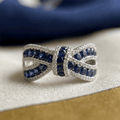 Bow Knot Design Round Cut Blue & White Sapphire Wedding Ring