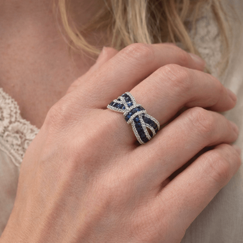 Elegant Knot Design Round Cut Blue & White Sapphire Half Eternity Wedding Band For Women