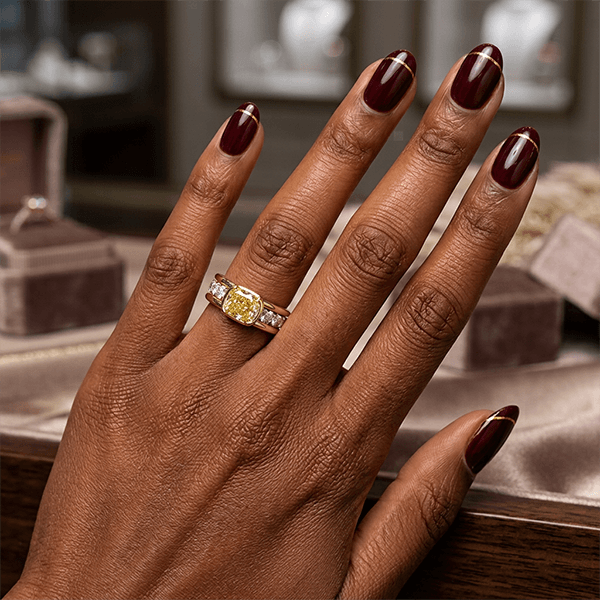 Elegant Bezel Cushion Cut Canary Sapphire Engagement Ring In Yellow Gold
