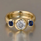 Bezel Round & Oval Cut White & Blue Sapphire Three Stone Engagement Ring For Women Belovegrace