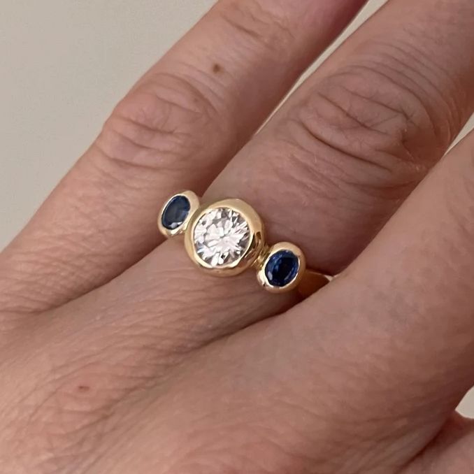Bezel Round & Oval Cut White & Blue Sapphire Three Stone Engagement Ring For Women Belovegrace