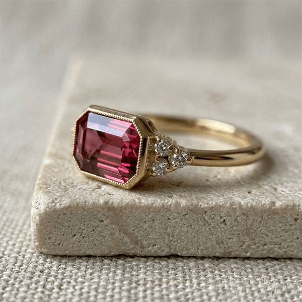 Golden Bezel Ruby Sapphire Emerald Cut Engagement Ring