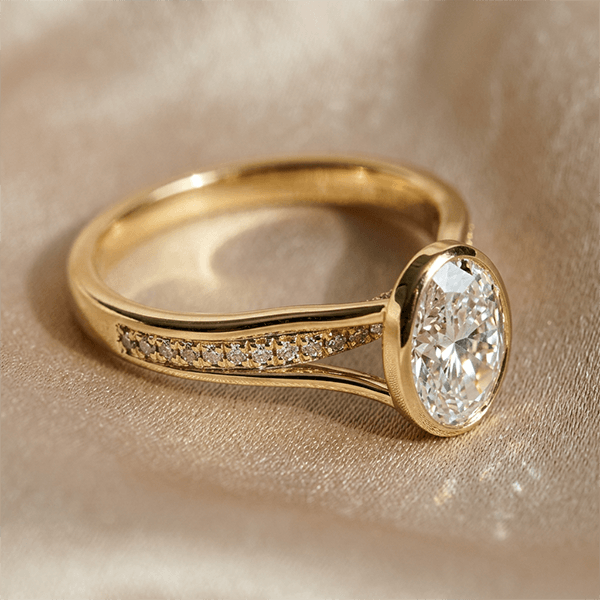 Vintage Bezel Pavé Band Oval Cut Yellow Gold White Sapphire Engagement Ring