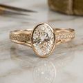 Vintage Bezel Pavé Band Oval Cut Yellow Gold White Sapphire Engagement Ring