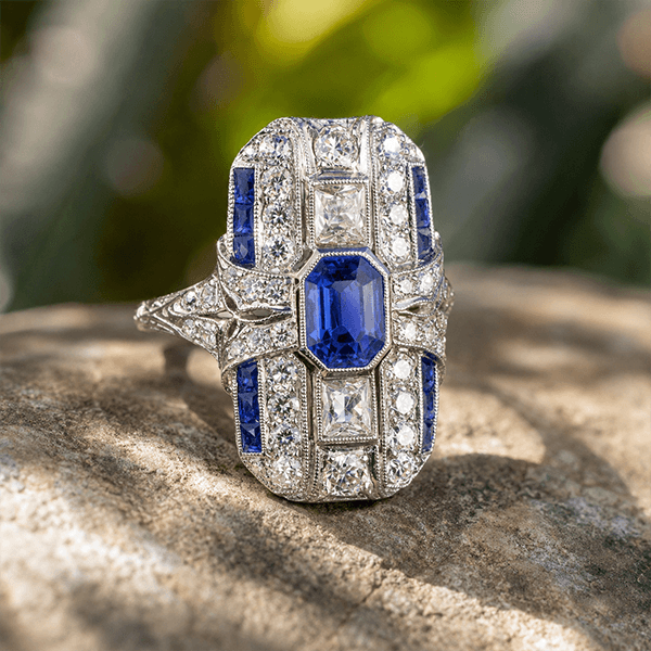 Art Deco Bezel Emerald Cut Blue Sapphire Halo Engagement Ring