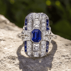 Art Deco Bezel Emerald Cut Blue Sapphire Halo Engagement Ring