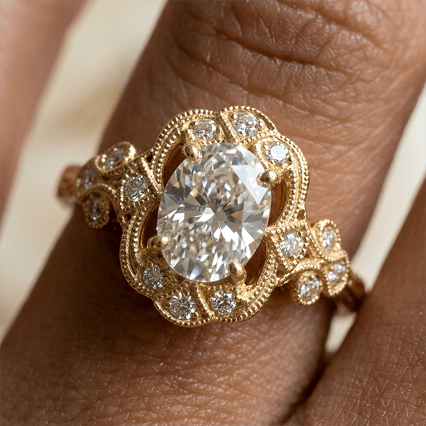 Art Deco Filigree Engraving Oval Cut White Sapphire Engagement Ring In Yellow Gold