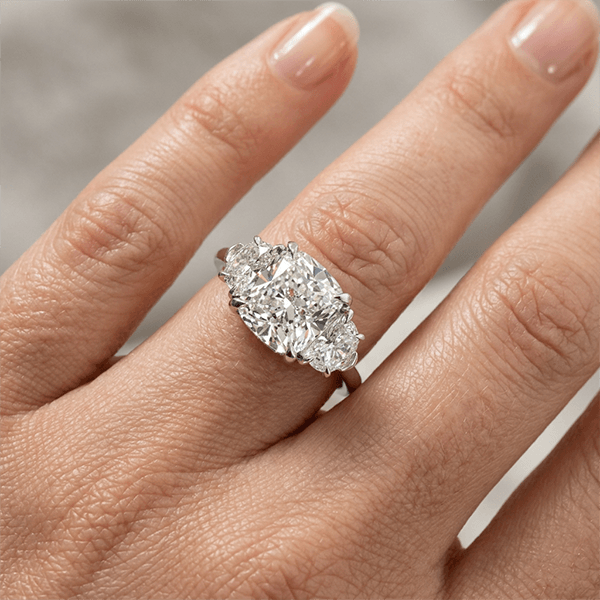 Elegant Three Stone Cushion Cut White Sapphire Engagement Ring