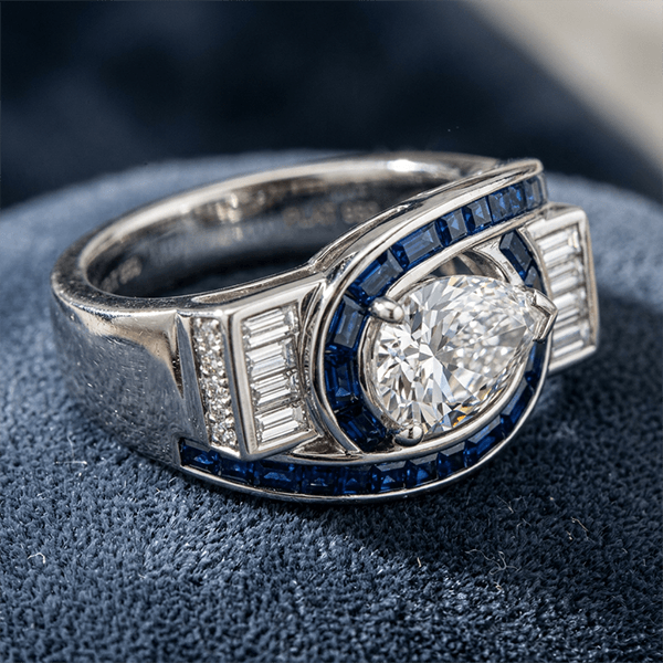 Unique Design Halo Pear & Baguette Cut White & Blue Sapphire Engagement Ring