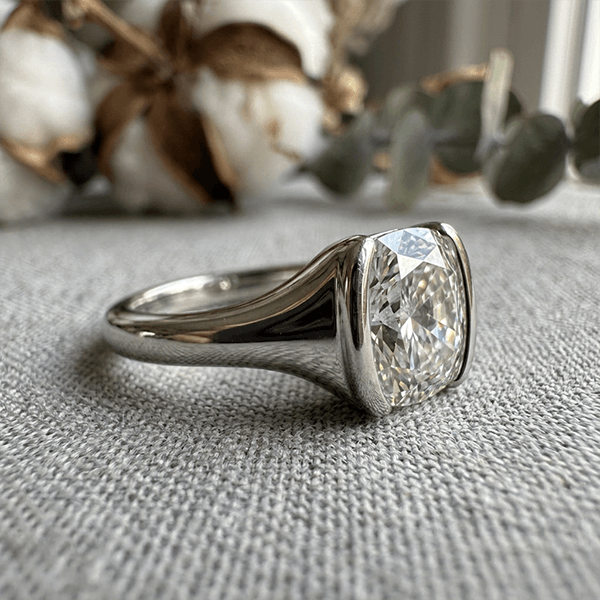 Classic Solitaire Half Bezel Cushion Cut White Sapphire Engagement Ring