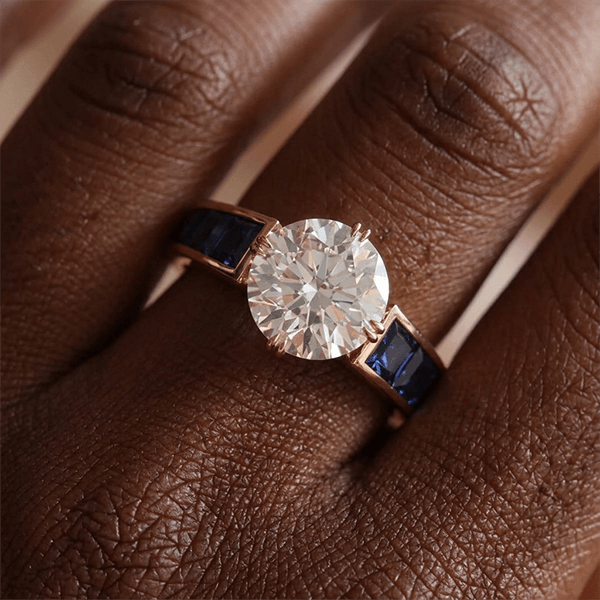 Double Prong White & Blue Sapphire Round & Baguette Cut Engagement Ring