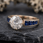 Double Prong White & Blue Sapphire Round & Baguette Cut Engagement Ring