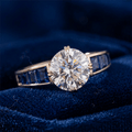Double Prong White & Blue Sapphire Round & Baguette Cut Engagement Ring
