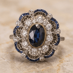 Art Deco Two Tone Halo Oval Cut Blue Sapphire Engagement Ring