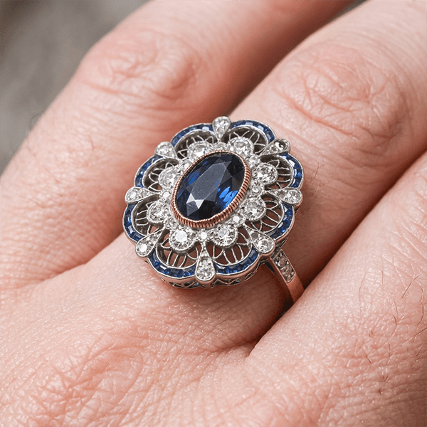 Art Deco Two Tone Halo Oval Cut Blue Sapphire Engagement Ring