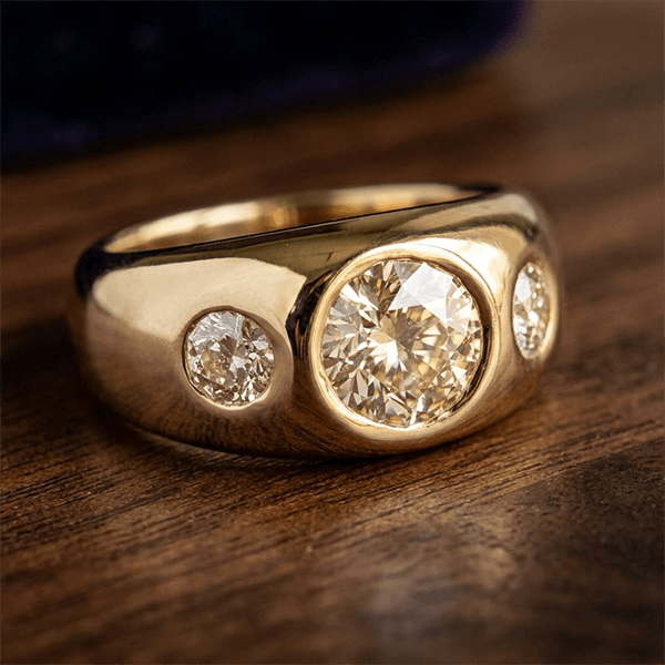 Bezel Set Golden Round Cut White Sapphire Three-Stone Engagement Ring