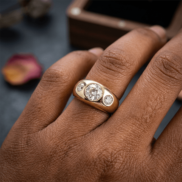 Bezel Set Golden Round Cut White Sapphire Three-Stone Engagement Ring