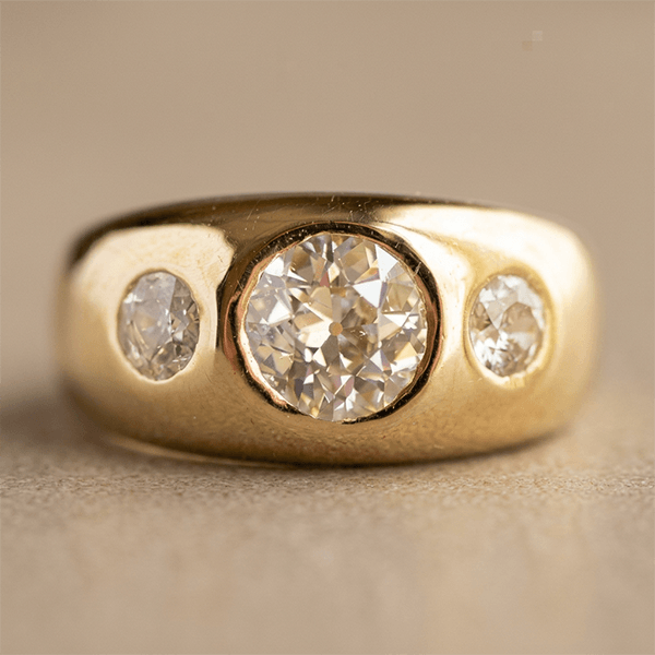 Bezel Set Golden Round Cut White Sapphire Three-Stone Engagement Ring