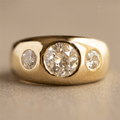 Bezel Set Golden Round Cut White Sapphire Three-Stone Engagement Ring