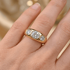 Bezel Set Golden Round Cut White Sapphire Three-Stone Engagement Ring