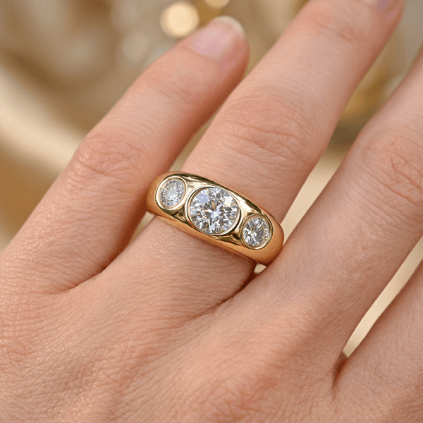 Bezel Set Golden Round Cut White Sapphire Three-Stone Engagement Ring