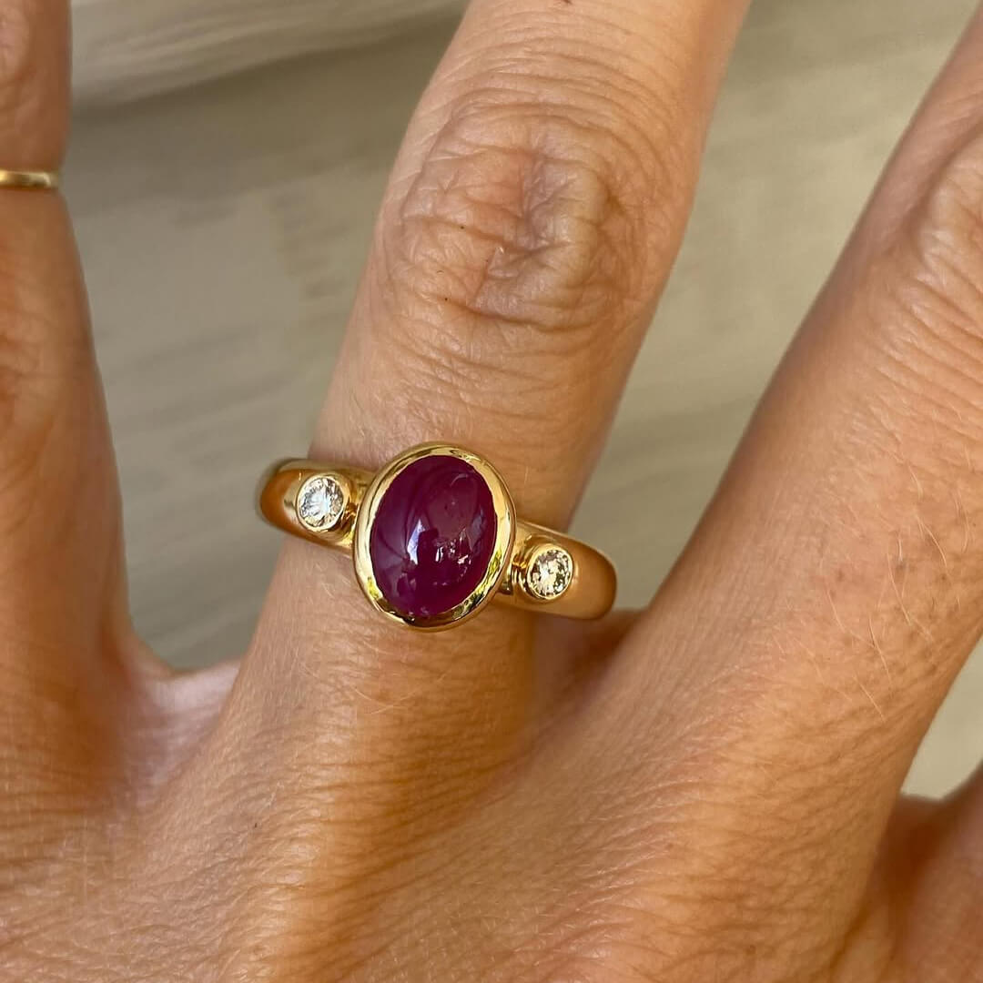 Ruby Birthstone Golden Three Stone Bezel Oval Cut Ruby Sapphire Engagement Rings