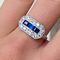 Luxury Jewelry Art Deco Halo Baguette & Round Cut Blue & White Sapphire Half Eternity Wedding Band For Women