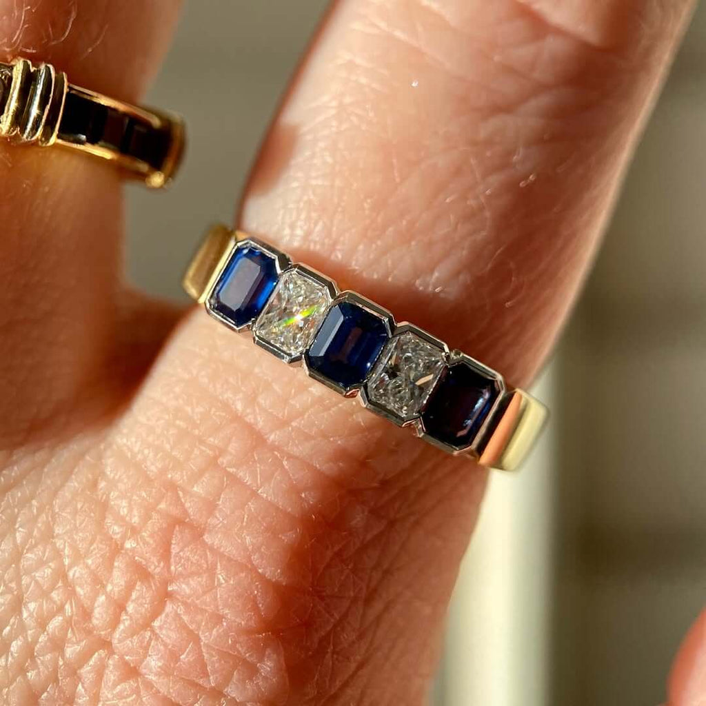 Classic Vintage Golden Bezel Emerald & Radiant Cut Blue & White Sapphire Half Eternity Wedding Band