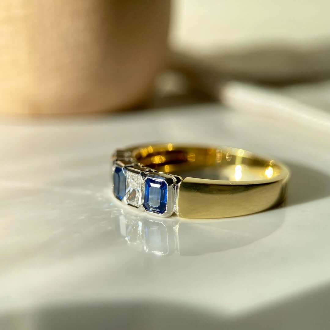 Classic Vintage Golden Bezel Emerald & Radiant Cut Blue & White Sapphire Half Eternity Wedding Band