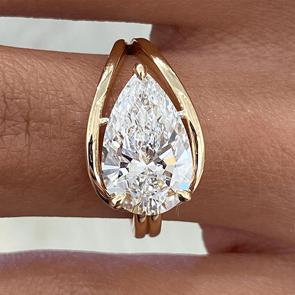 Unique Design Golden Solitaire Split Shank Pear Cut White Sapphire Engagement Rings