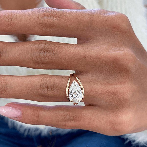 Unique Design Golden Solitaire Split Shank Pear Cut White Sapphire Engagement Rings