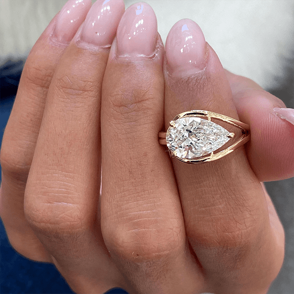 Unique Design Golden Solitaire Split Shank Pear Cut White Sapphire Engagement Rings