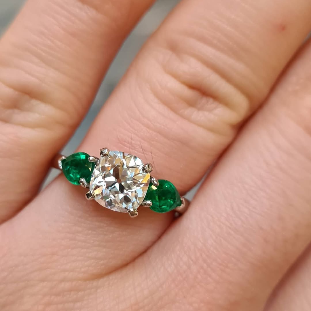 Classic Three Stone Cushion & Pear Cut White & Emerald Sapphire Engagement Rings