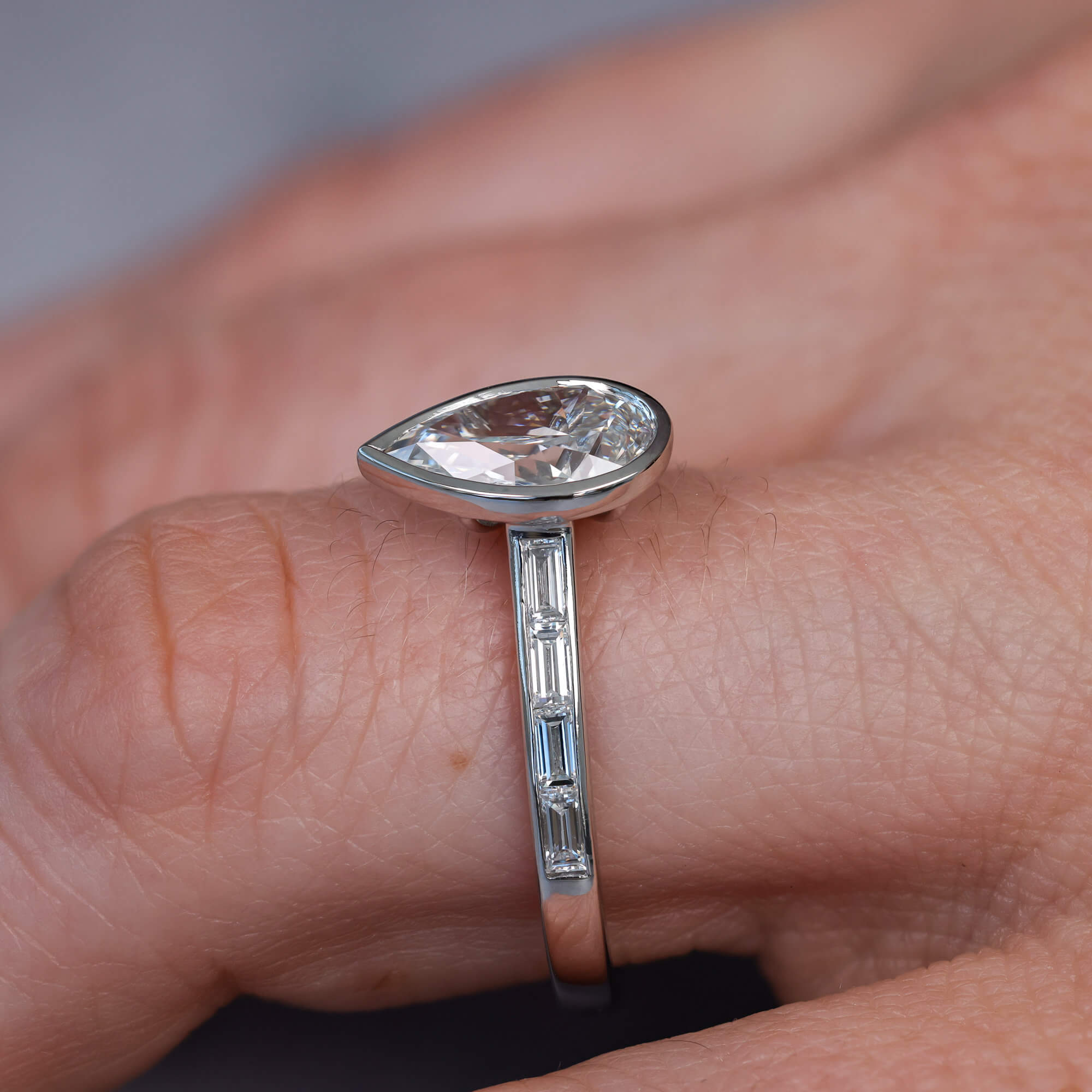 Classic Bezel Pear & Baguette Cut White Sapphire Engagement Rings