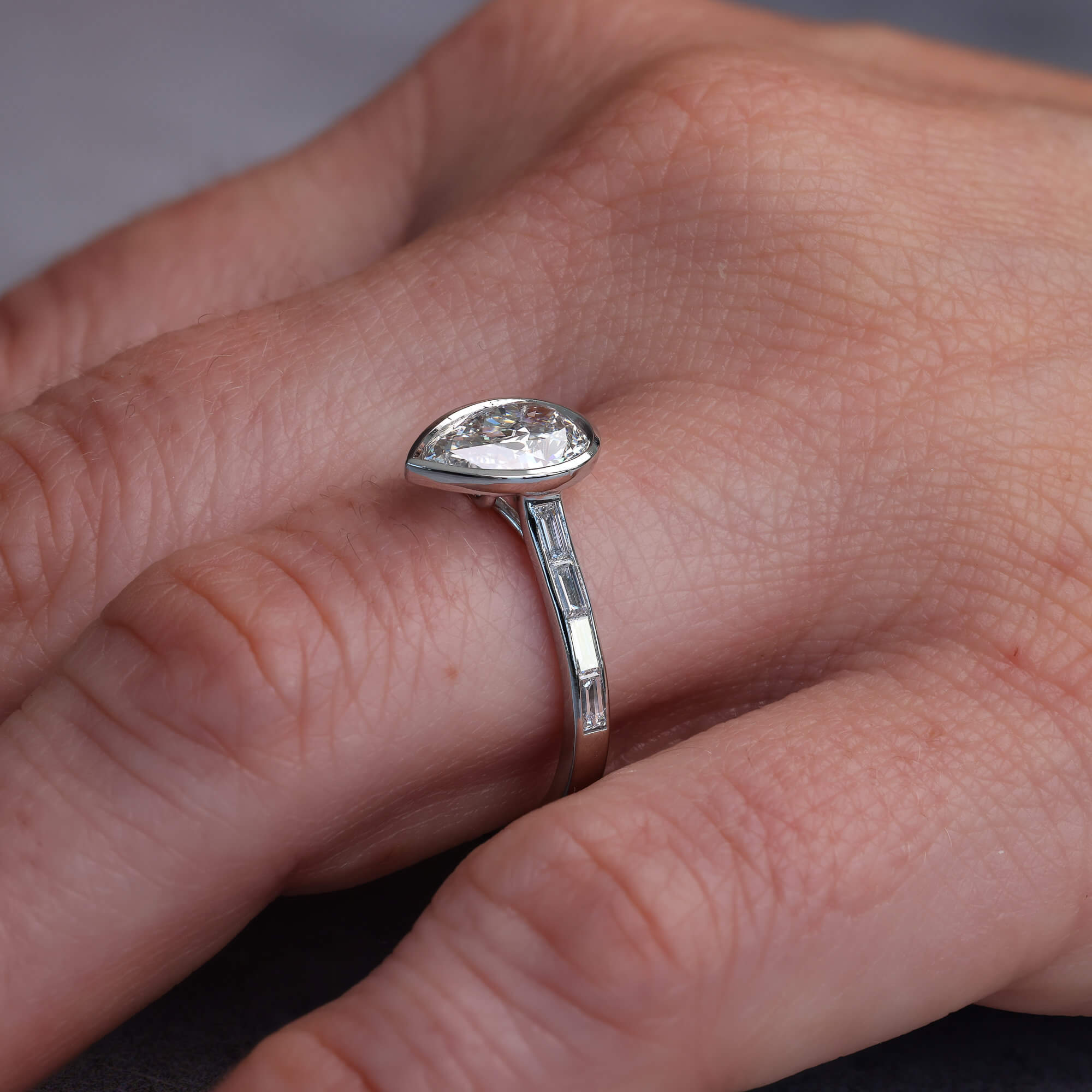 Classic Bezel Pear & Baguette Cut White Sapphire Engagement Rings