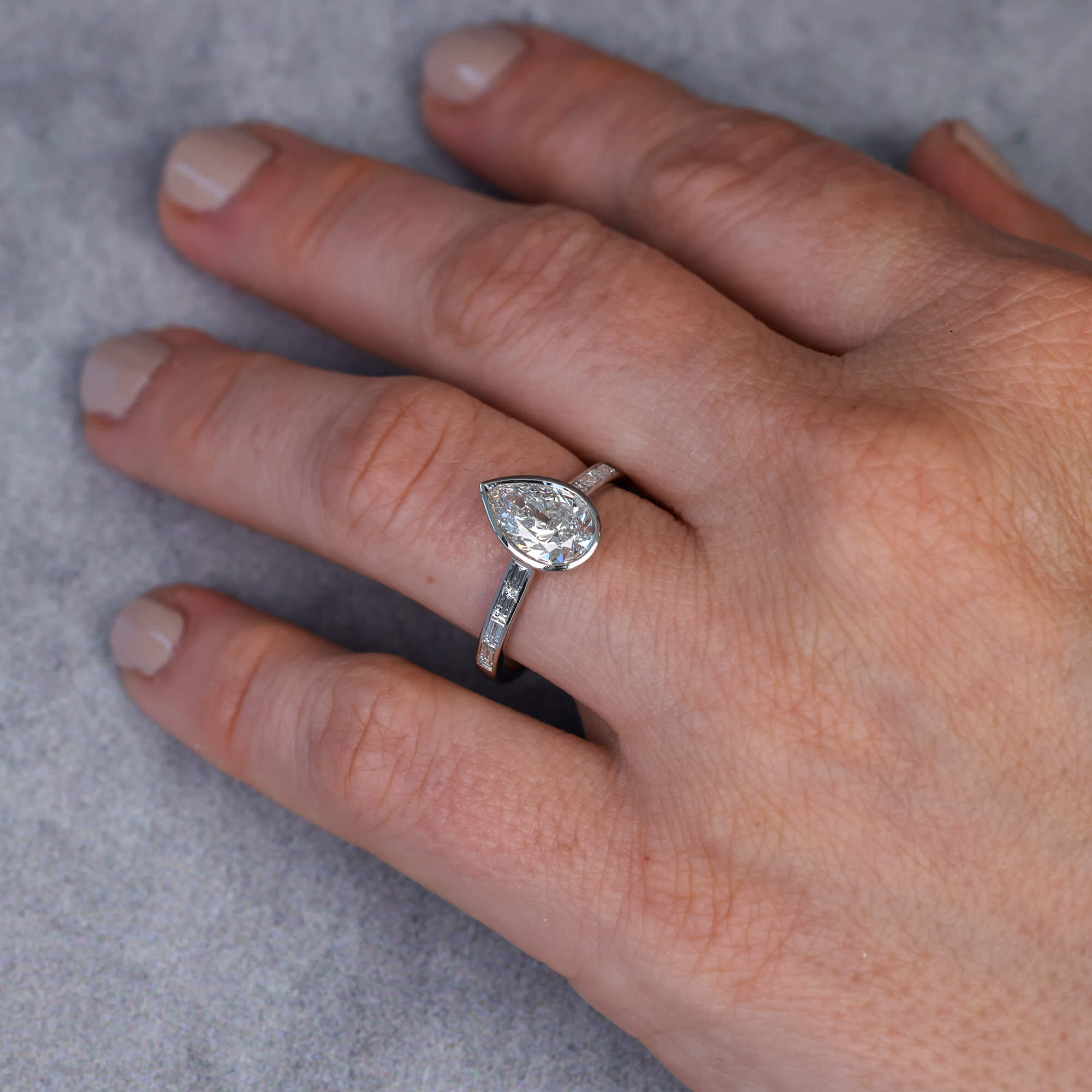 Classic Bezel Pear & Baguette Cut White Sapphire Engagement Rings