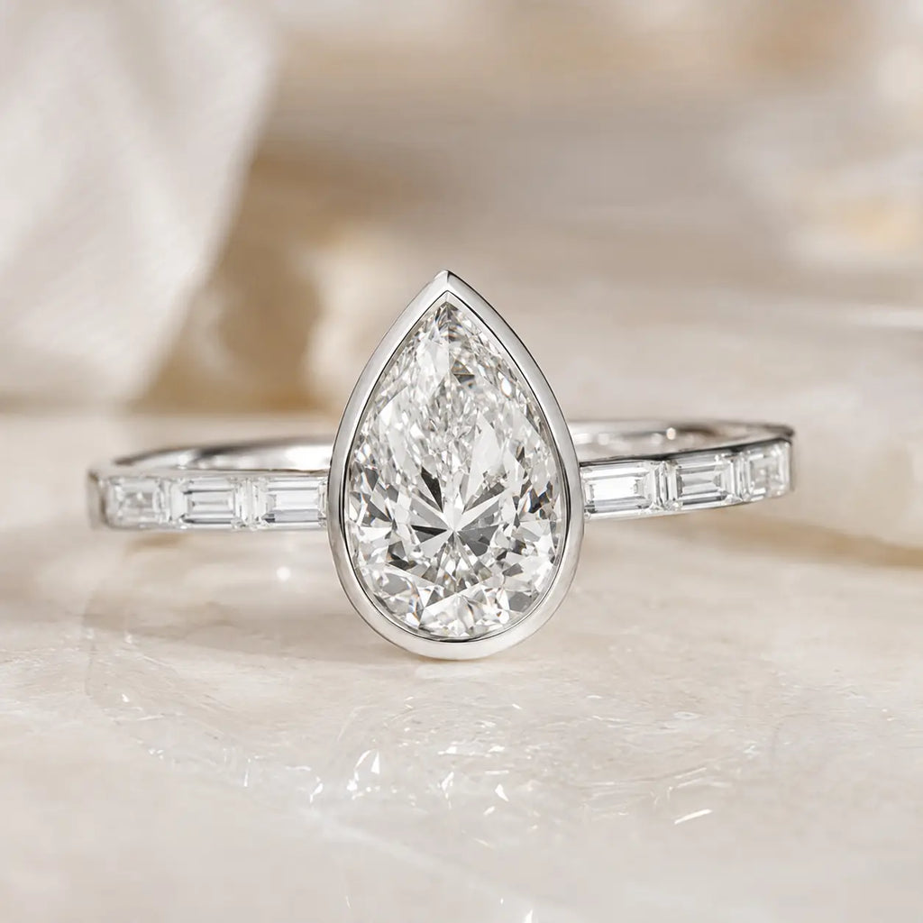 Classic Bezel Pear & Baguette Cut White Sapphire Engagement Rings