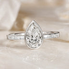 Classic Bezel Pear & Baguette Cut White Sapphire Engagement Rings